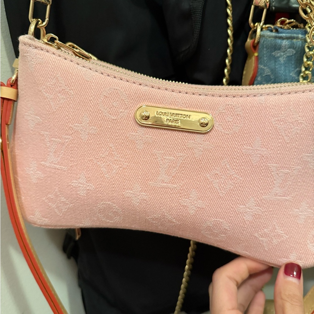 Louis Vuitton Light Pink Clutch with Gold Accents